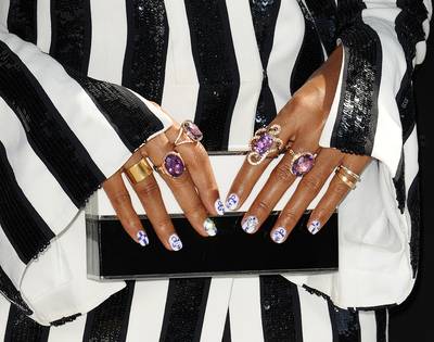 2016: Janelle Monáe - Janelle Monáe&nbsp;found the perfect way to pay tribute to&nbsp;Prince&nbsp;at the 2016 BET Awards. Take note of how the singer not only rocked the legendary performer’s signature symbols on her nails, but also found a way to incorporate “Purple Rain”-inspired jewelry. Perfection! (Photo by Jason LaVeris/FilmMagic)&nbsp; (Photo by Jason LaVeris/FilmMagic)