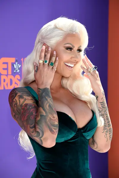2018: Amber Rose - Amber Rose&nbsp;had us “ooh-ing” over her minimal blush pink manicure which paired perfectly with gold, diamonds, and emeralds. (Photo by Kevin Mazur/Getty Images for BET)Watch the 2021 BET Awards on June 27 at 8/9C p.m. (Photo by Kevin Mazur/Getty Images for BET)
