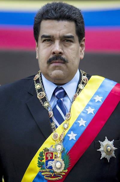 Venezuelan President Accuses VP Biden of Attempted Coup - According to The Guardian, the United States has rejected Venezuelan President Nicolas Maduro’s recent claim that U.S. Vice President Joe Biden had plotted to overthrow him. “President Maduro’s accusations are patently false and are clearly part of an effort to distract from the concerning situation in Venezuela, which includes repeated violations of freedom of speech, assembly, and due process,” Biden’s office said in a statement. The plummeting price of oil has crippled Venezuela’s economy and led to ongoing, widespread protests.(Photo: EPA/MIGUEL GUTIERREZ /LANDOV)