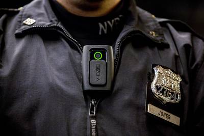 Policing - The budget provides $97 million for local law enforcement training and oversight and body cameras. The funding is part of a three-year, $263 million proposal.   &nbsp;(Photo: Andrew Burton/Getty Images)