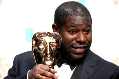 Steve McQueen - This English director bolted to the front of Hollywood's radar following the release of 12 Years a Slave, which he directed and wrote. The historical drama sweeped during 2013's awards season, even snagging three Oscars for Best Picture, Best Supporting Actress (Lupita Nyong'o) and Best Adapted Screenplay. The Best Picture win made McQueen the first even Black producer to receive the award and the first Black director to have directed a Best Picture winning film.(Photo: Dave J Hogan/Getty Images)