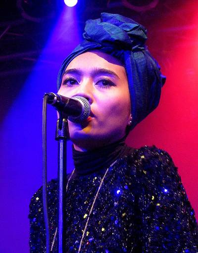 Yuna the Fashionista - Yuna's&nbsp;second love, fashion, inspired her to launch November Culture, an online store which emphasizes colorful, modest clothing that defines her personal style.&nbsp;  (Photo: Rick Davis / Splash News)