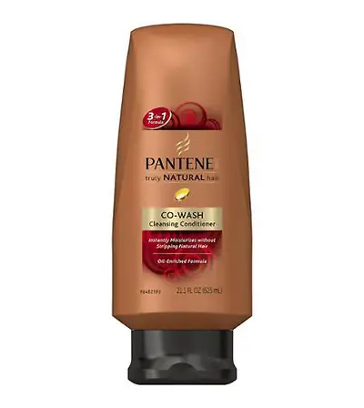 Try a Dry Shampoo - Shampoos contain harsh detergents that strip moisture from your natural strands. Go for a clarifying conditioner, such as Pantene CoWashing Conditioner, to cleanse the scalp and keep natural hair moisturized.(Photo: Pantene)