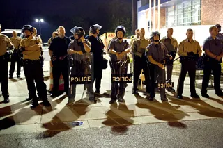 Joining Forces - Police from St. Louis County and neighboring county Overland patrol the protests.&nbsp;(Photo: Lucas Alvarado-Farrar/Whose Streets Media)