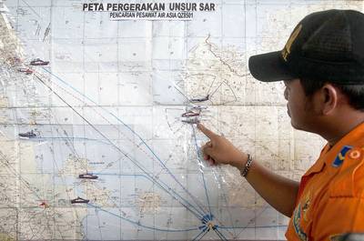 Officials Say Debris, Bodies Are From Missing Plane - Debris and bodies from the missing AirAsia jet that vanished over the weekend have reportedly been found in the Java Sea, according to a statement from the airline. The plane, which was en route to Singapore and carrying 162 people, disappeared on Sunday. &quot;There is at least some closure as opposed to not knowing what's happened and holding out hope,&quot; said AirAsia CEO Tony Fernandes at a news conference.(Photo: Trisnadi Marjan/AP Photo)