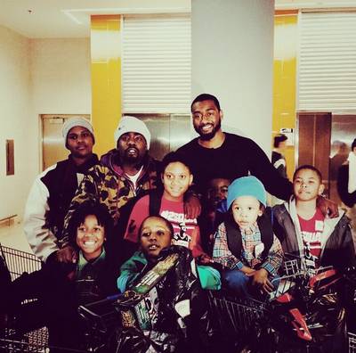 Wale - Repping for the DMV, Wale and Washington Wizards basketball star John Wall put their funds together and blessed some kids for the holiday. The MMG capo posted on Instagram,&nbsp;&quot;Me and&nbsp;@johnwall&nbsp;took some of the yungins shoppin today&nbsp;@officialwashingtonwizards&nbsp;we Movin around the DMV&nbsp;#moonz&nbsp;#5deep.&quot;(Photo: Wale via Instagram)