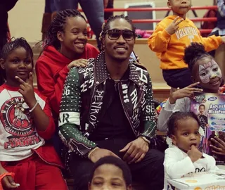 Future - It's cold this winter and Future made sure some of the lil homies didn't walk around freezing. Future Hendrix flooded the streets of ATL with a few bombers as he hosted his second annual Freebandz Coat Drive this week.&nbsp;(Photo: Future via Instagram)