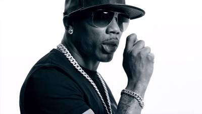 Nelly's Greatest Hits - Over the years,&nbsp;Nelly has put out some pretty dope tracks, like the video pictured here (&quot;Get Like Me&quot;) — a braggadocious ode to the cool kids.  Take a ride with us down memory lane. You might want to break out the old CDs, too!  (Photo: Universal Republic Records)