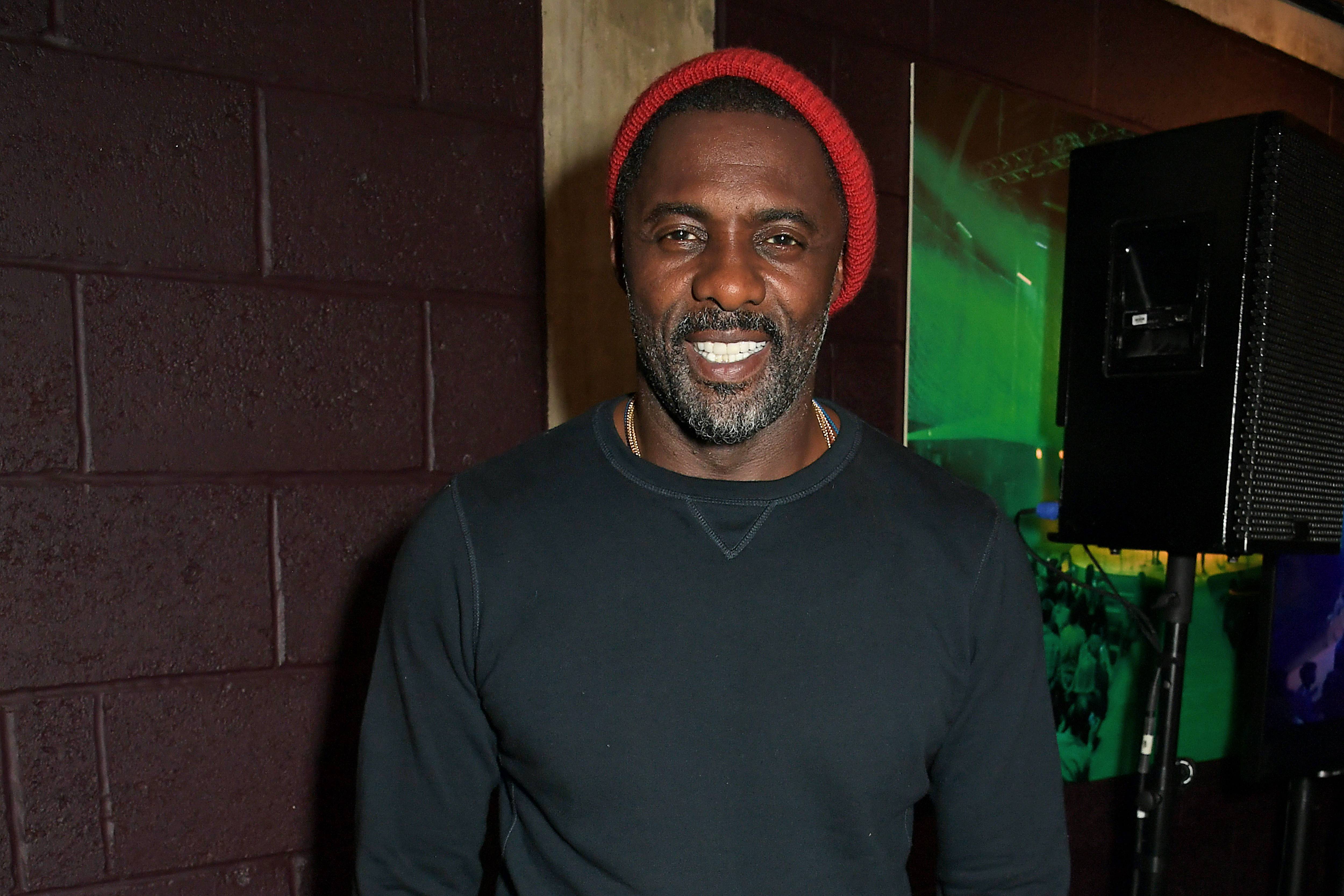 Idris Elba Choking On Hot Wings Is The Newest Meme To Sweep The