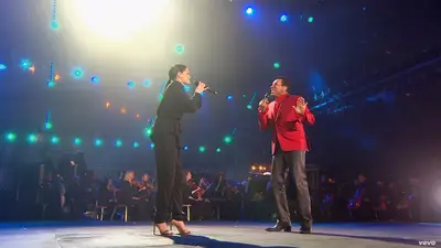 Cruisin' – October 2014  - Jessie J took the stage with R&amp;B/soul icon Smokey Robinson to perform his chart-topping hit &quot;Cruisin'&quot; in Scotland. If you were already a real Smokey Robinson fan, then you'll love their smooth duet together. (Photo: BBC / The Verve Music Group)