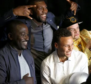 The Players' Club - The Golden State Warriors crew gather up for a group pic and share some laughs with one of their hypest fans. (Photo: Gabe Ginsberg/BET/Getty Images for BET)