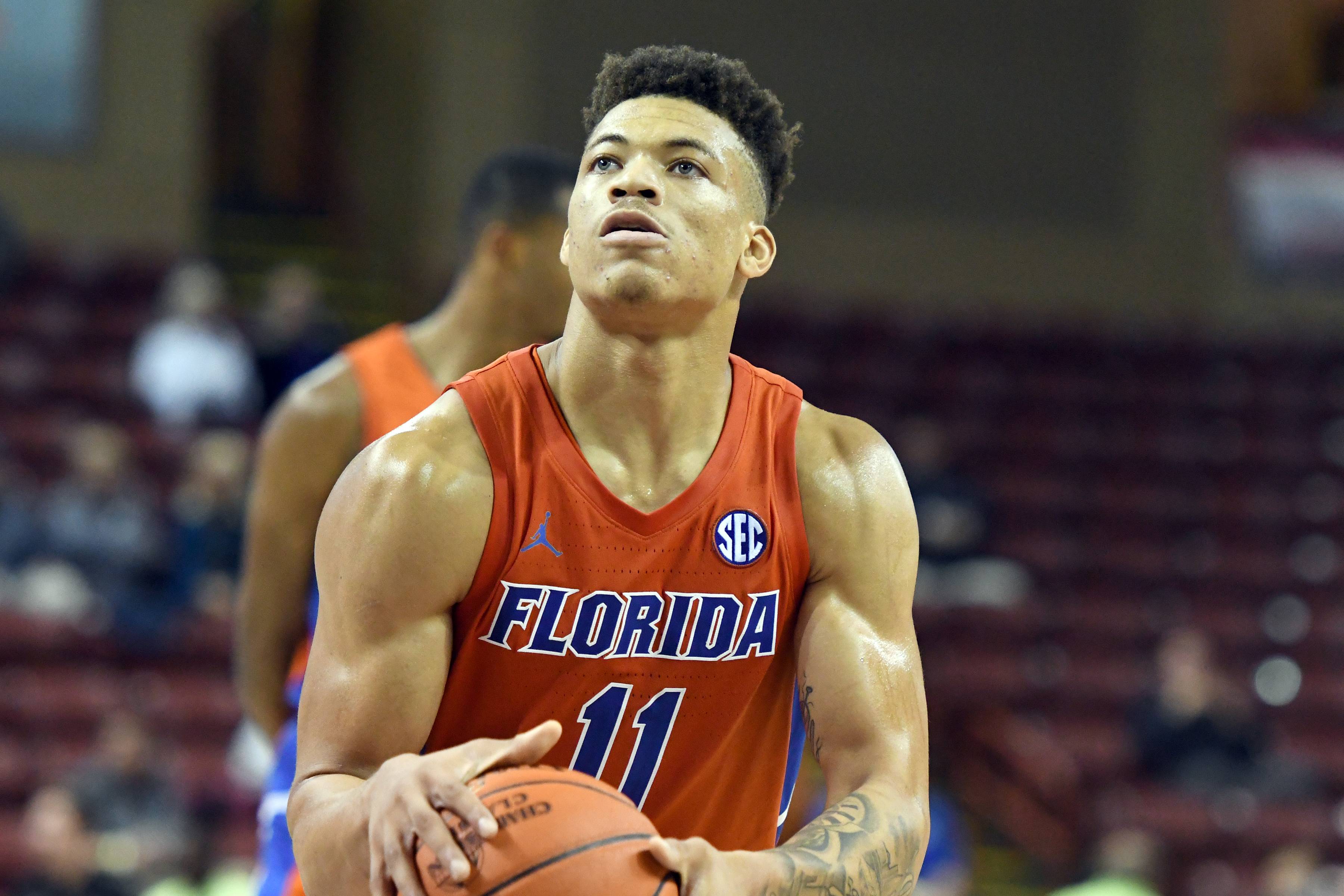 CHARLESTON, SC - NOVEMBER 21:  Keyontae Johnson #11 of the Florida Gators takes a foul shot during a first round Charleston Classic basketball game against the Saint Joseph's Hawks at the TD Arena on November 21, 2019 in Charleston, South Carolina.  (Photo by Mitchell Layton/Getty Images)