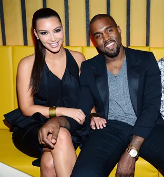Keeping Up… - Kanye joined Kim and the family for the opening of Kourtney Kardashian’s beau's (Scott Disick) restaurant RYU in New York. She wore a halter dress and gold cuff while he opted for a cozy T-shirt under a suit and a gold watch.   (Photo: Albert Michael/startraksphoto.com)