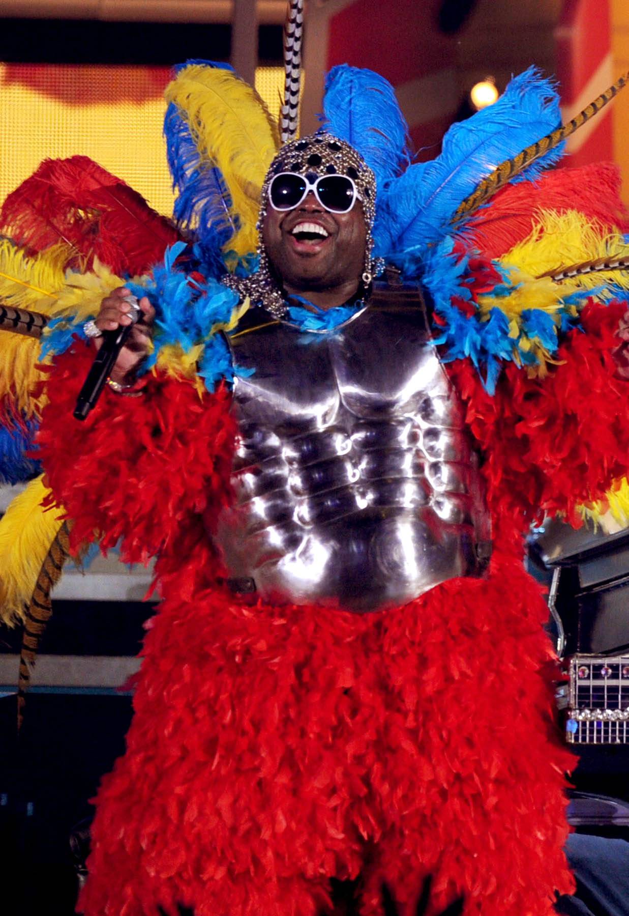 Cee Lo - Never afraid to shine, Cee Lo Green loves a little pageantry. Check this feather and steel number worn during a performance at the 53rd Annual GRAMMY Awards, when he sang with Jim Henson's muppets.&nbsp;   (Photo: Kevin Winter/Getty Images)