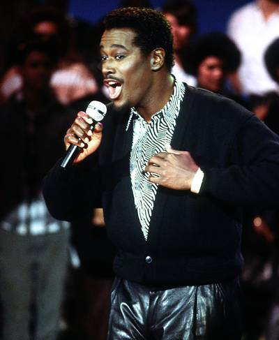 Luther Vandross - Grammy Award-winning R&amp;B singer Luther Vandross visited the American Bandstand set for the first time in February 1987.(Photo: Ron Wolfson/Landov)