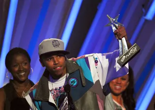 Run It! - Before he realized that some girls aren't "Loyal," he was trying to see if they could "Run It." Here's a young Chris Brown holding the award for Best New Artist in 2006.&nbsp;(Photo: M. Caulfield/WireImage.com)
