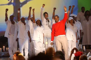 Kanye West - Jay-Z's prodigy and producer brings the church to the people as he peforms "Jesus Walks" with an all-white clad choir. (Photo: M. Caulfield/WireImage.com/Getty Images)