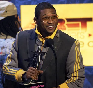 Usher - The "Yeah!" performer also wins the Best Male R&amp;B Artist award at the&nbsp;4th Annual BET Awards at the&nbsp;Kodak Theatre in Hollywood, California, June 29, 2004.(Photo: M. Caulfield/WireImage.com/Getty Images)
