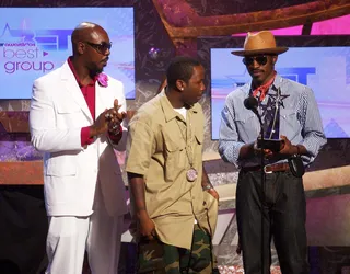 OutKast - The "Roses" rappers accept their award with the support of Sleepy Brown for Best Group.&nbsp;(Photo: M. Caulfield/WireImage.com/Getty Images)