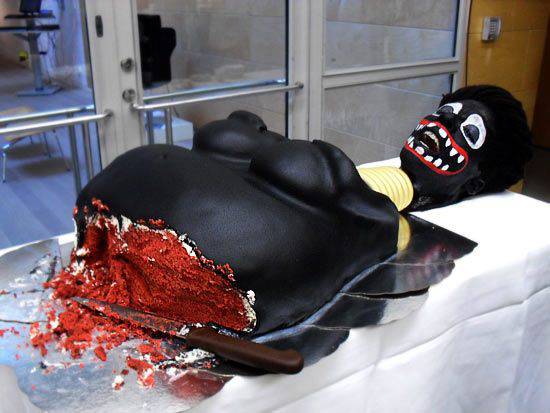 Cake decorated in lackfacbe for female genital mutilation event