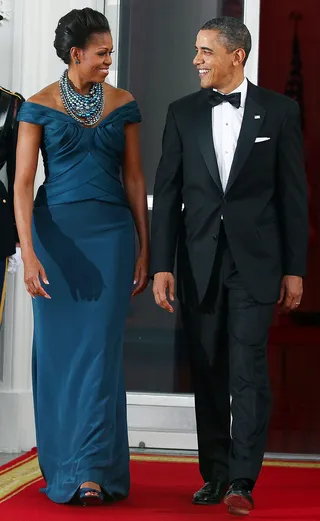 Michelle Obama and Barack Obama - Does it get anymore breathtaking than the President and First Lady!? This power couple is always impeccably dressed and it’s so adorable to see them sneak flirty glances at each other while attending some of the world’s most formal affairs. (Photo: Mark Wilson/Getty Images)