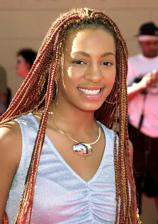 Humble Beginnings - At the tender age of 15, Solange made her unofficial debut to the world when she joined the Destiny’s Child crew after replacing one of the group’s departing dancers. She even temporarily stood in for DC3 alumna&nbsp;Kelly Rowland during the girl group's opening set for singer Christina Aguilera after the "Motivation" singer broke her toes backstage during a costume change.(Photo: Gregg DeGuire/WireImage)