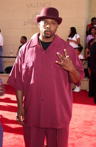 Nate Dogg\r&nbsp; - Decked in deep tones with his signature head gear, the rapper/singer keeps it smooth as ever on the red carpet. &nbsp;(Photo: Gregg DeGuire/WireImage)