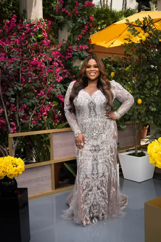 Nina Parker flaunts curves in an embellished evening gown. - (Photo By: Brandon Hickman/E! Entertainment/NBCU Photo Bank via Getty Images)