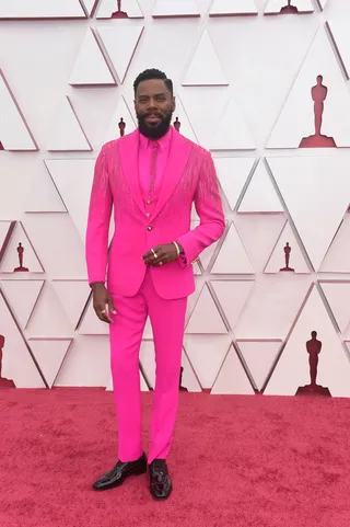 Colman Domingo makes a statement in a hot-pink Versace suit. - (Photo: ABC via Getty Images)