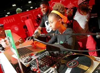 Youngest in Charge - DJ Young 1 gave the crowd a smooth medley of songs that was a mix of contemporary hits as well as back-in-the-day classics. (Photo: Rich Polk/BET/Getty Images for BET)