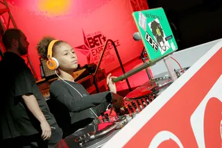 Numero Uno - DJ Young 1 continues to keep the crowd moving as she goes into another set.(Photo: Rich Polk/BET/Getty Images for BET)