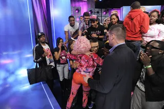 Hug Me Now - Nicki Minaj acknowledges her Barbs during a commercial break at 106 &amp; Park, April 3, 2012. (photo: John Ricard / BET)