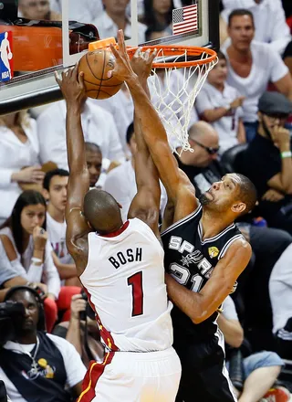 Chris Bosh Adds Critical Defense &nbsp; - Chris Bosh did not add to the Heat's offense during Game 7. He missed a dunk over Duncan in the first half. But he was able to nab seven rebounds during the match-up.&nbsp;(Photo: Kevin C. Cox/Getty Images)
