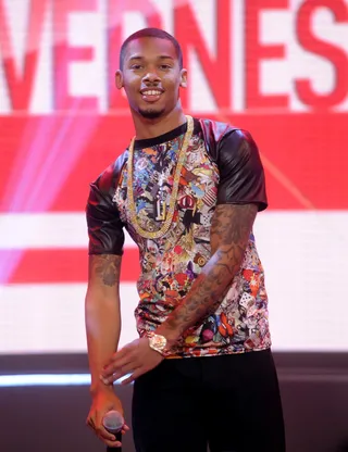 Stunt For 'Em - Malik Davage takes a second before taking the stage to pose for a picture showing off all his pearly whites.(Photo: John Ricard / BET)
