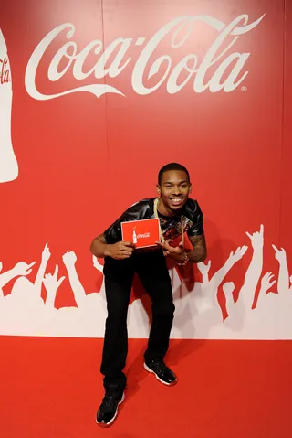 You Won Man! - W.O.W. winner Malik Davage poses in front of the Coca-Cola stop and repeat at 106 &amp; Park. Look who's excited about #winning.(Photo: John Ricard / BET)