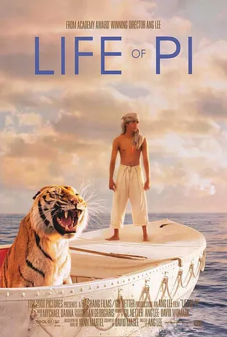 Life of Pi: November 21 - Ang Lee directs this adventure tale of discovery about a young man who survives a tragic sea disaster and ends up marooned on a lifeboat with a Bengal tiger.  (Photo: Fox 2000 Pictures)