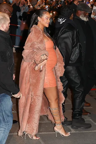 Rihanna Rocks Crop Top & Skirt & Shows Off Bare Baby Bump On Night