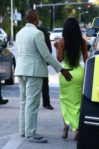 Kanye West and Kim Kardashian-West - KimYe made quite the entrance to 2 Chainz's wedding with their outfits but right before the festivities, Kanye was feeling Kim up. He also had to lift her into the car, which makes sense since her dress looked a little tight. (Photo: Back Grid)