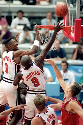 Double Team - Jordan and Pippen team up to sink the ball in the net in a game against Croatia. (Photo: DPA /LANDOV)