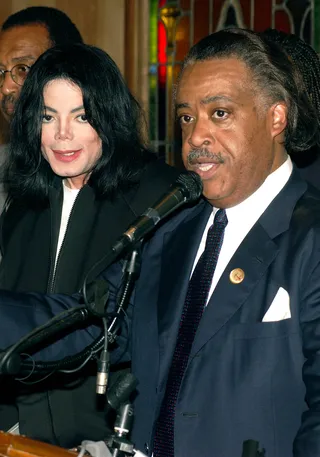 Using His Voice - Recording artist Michael Jackson and Rev. Al Sharpton participate in the Michael Jackson vs. Sony Hip Hop Summit at the National Action Network headquarters on July 8, 2002, in New York City. Jackson contends that current music industry contract conventions are unfair for recording artists. (Photo: Lawrence Lucier/Getty Images)