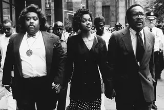 Facing Controversy - American religious leader and civil rights activist Rev. Al Sharpton, Tawana Brawley and attorney C. Vernon Mason hold hands outside the State Supreme Court, New York, July 20, 1990. The trio, at the court to attend the so-called Central Park Jogger trial, had been involved in another high-profile rape case when, in the late 1980s, Brawley accused six men of kidnapping and rape. (Photo: New York Times Co./Getty Images)