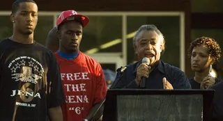 Jena 6 - Rev. Al Sharpton speaks with two of the Jena 6, Robert Bailey Jr. (L) and Theo Shaw, in front of the LaSalle Parish Courthouse in Jena, Louisiana, on September 20, 2007. During the National Action Network's Vigil for the Jena 6, thousands of protesters gathered for a march on the Louisiana town of Jena in protest of the criminal trial of six Black teens charged in an alleged attack on a white classmate. The fight was sparked between the youths after several nooses were hung from a tree at a high school. &nbsp;(Photo: Matthew HINTON/AFP/Getty Images)