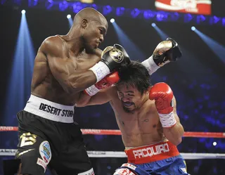 Fighting Back - Bradley goes on the offense against Pacquiao.&nbsp;(Photo: AP Photo/Chris Carlson)