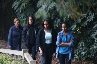 Three Generations - Sasha and Malia also joined Mrs. Obama and her mother as they further explored the Chengdu Panda Research Base.(Photo: Feng Li/Getty Images)