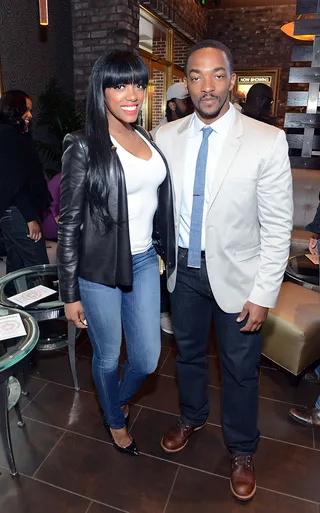 Mix and Mingle - Anthony Mackie takes a pic with Real Housewives of Atlanta starlet Porsha Stewart at the Atlanta screening of his new film Captain America: The Winter Soldier at Cinebistro in Atlanta. (Photo: Paras Griffin/Getty Images)