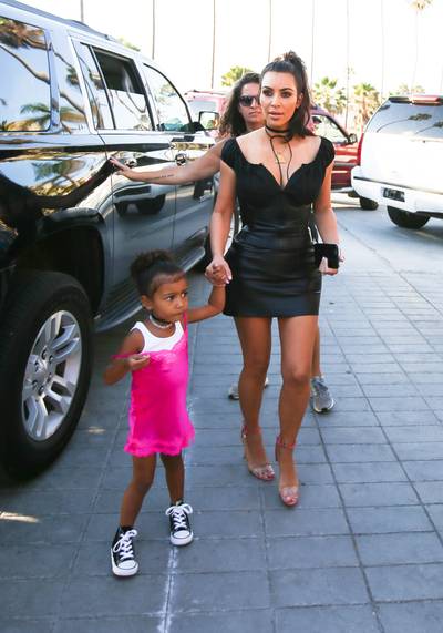 All Star - North is such a rebel with this hot pink ensemble and all black Chucks.(Photo:&nbsp;Splash News)