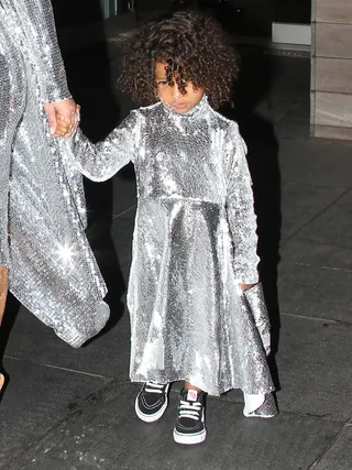 Silver Surfer - North stepped out in NYC twinning with&nbsp;Kim Kardashain in a silver sequin number but ditched the heels for some sneaks by surfer shoe brand Vans.(Photo:&nbsp;Said Elatab / Splash News)
