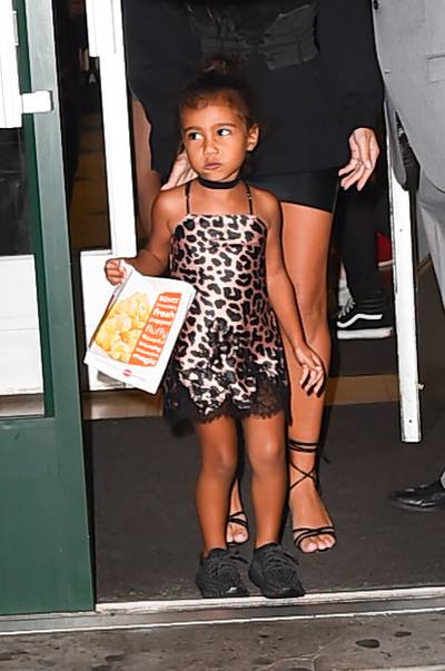Spotted This Season - North was having Keeping Up With the Kardashians seasons 1-4 nostalgia, so she threw on this leopard-print slip dress.(Photo: Raymond Hall/GC Images)&nbsp;