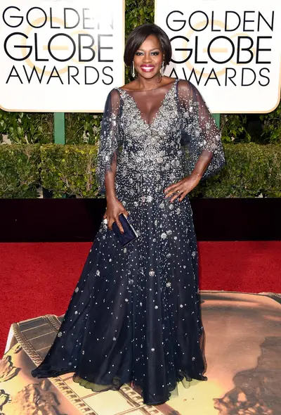 Viola Davis - The How to Get Away With Murder star and Best Actress in a Drama Series nominee looks covered in stardust in this beautiful gown.(Photo: Jason Merritt/Getty Images)