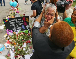 Iyanla Vanzant Heads to Ferguson&nbsp; - Iyanla Vanzant comforts residents in Ferguson.(Photo: AP Photo/Atlanta Journal-Constitution, Curtis Compton)